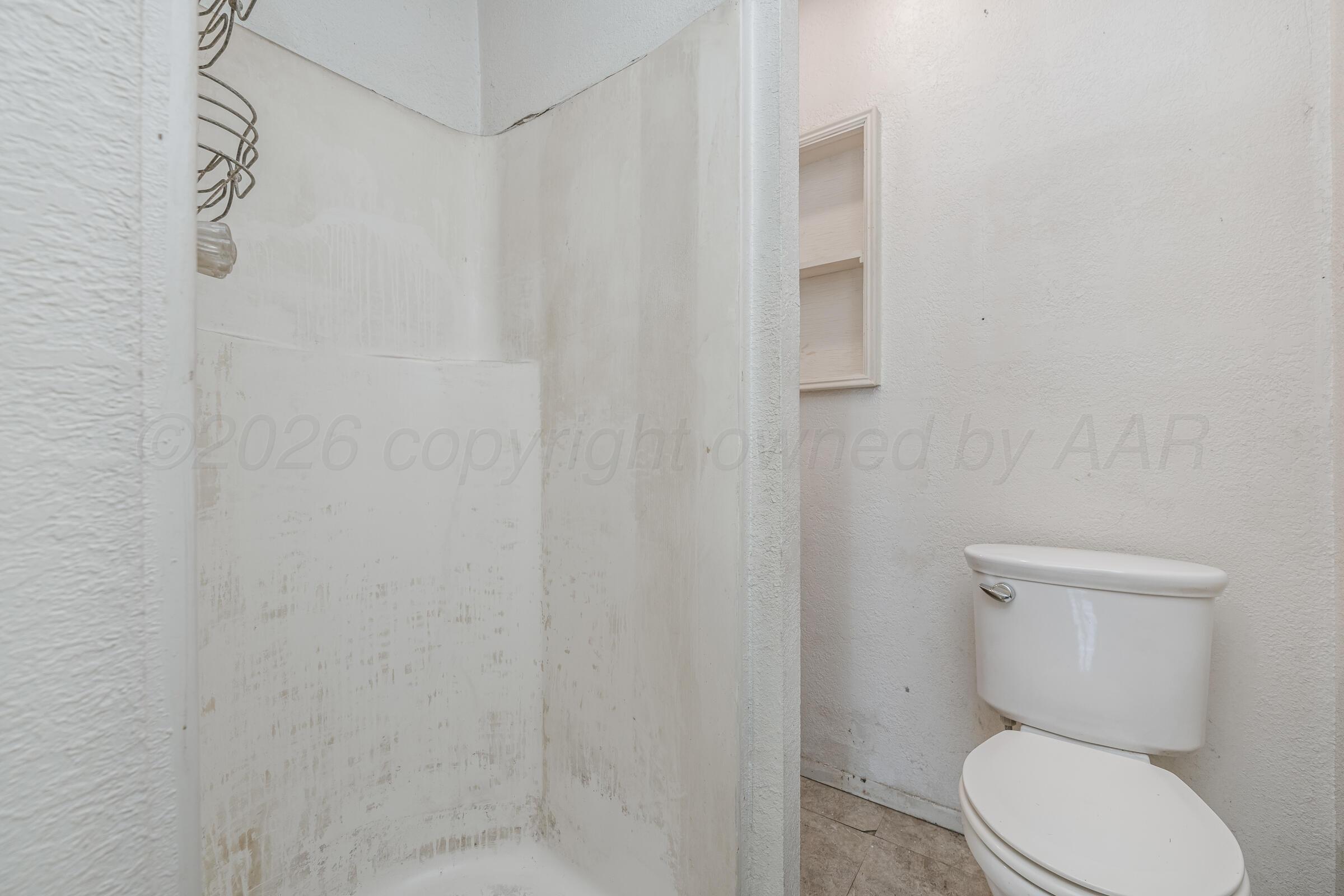 4606 South Hayden Street Amarillo, TX 79110 - Photo 13 of 19 Owners Bathroom