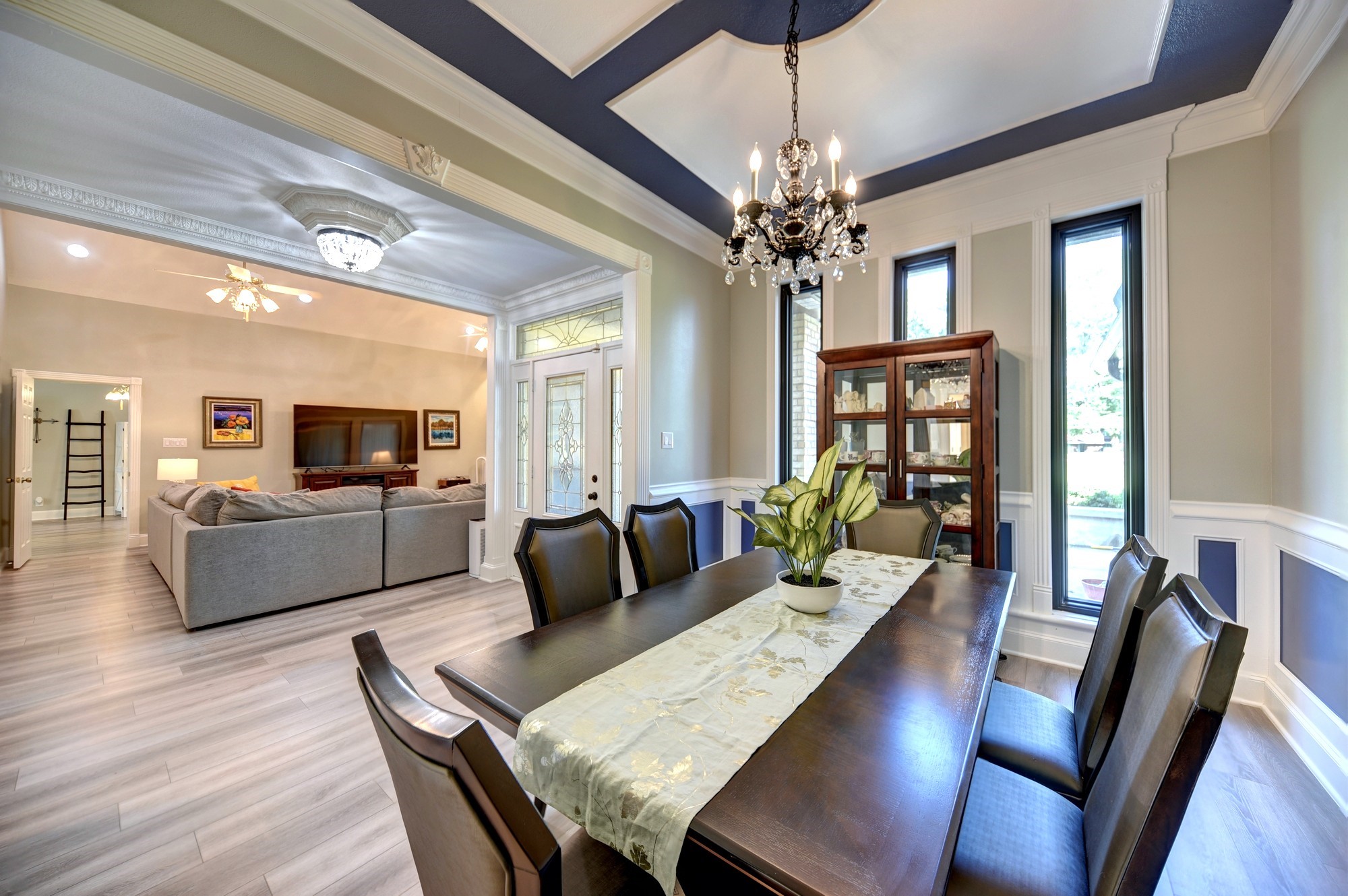 1950 Country Club Road Brenham, TX 77833 - Photo 11 of 39 a view of a dining room with furniture window and wooden floor
