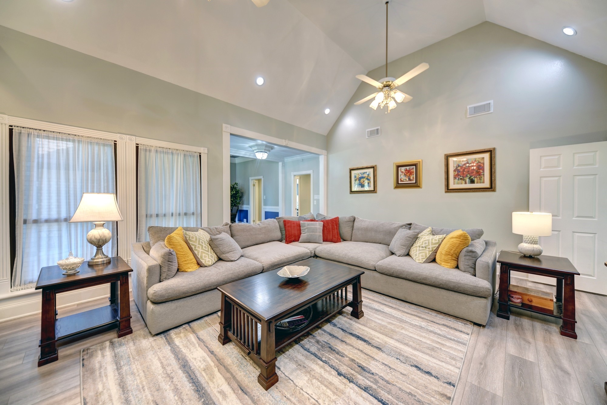 1950 Country Club Road Brenham, TX 77833 - Photo 13 of 39 a living room with furniture and a lamp
