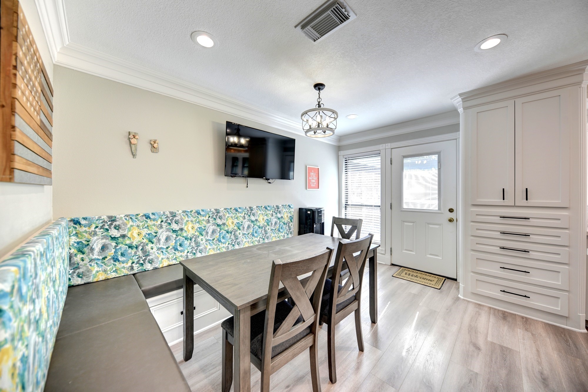 1950 Country Club Road Brenham, TX 77833 - Photo 18 of 39 a view of a dining room with furniture and a flat screen tv