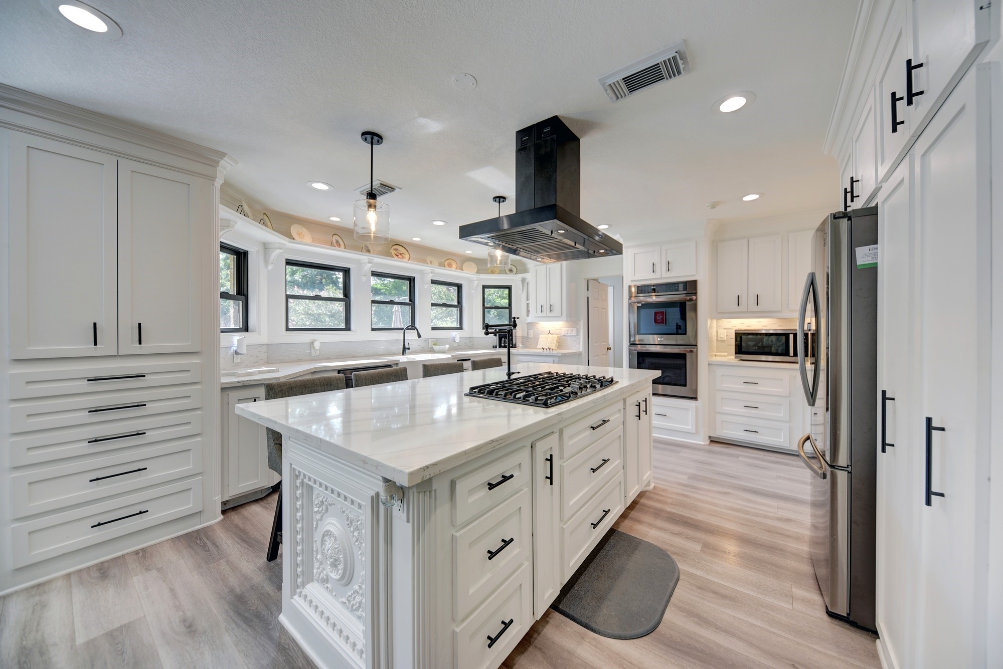 1950 Country Club Road Brenham, TX 77833 - Photo 2 of 39 a kitchen with stainless steel appliances a stove oven and a refrigerator