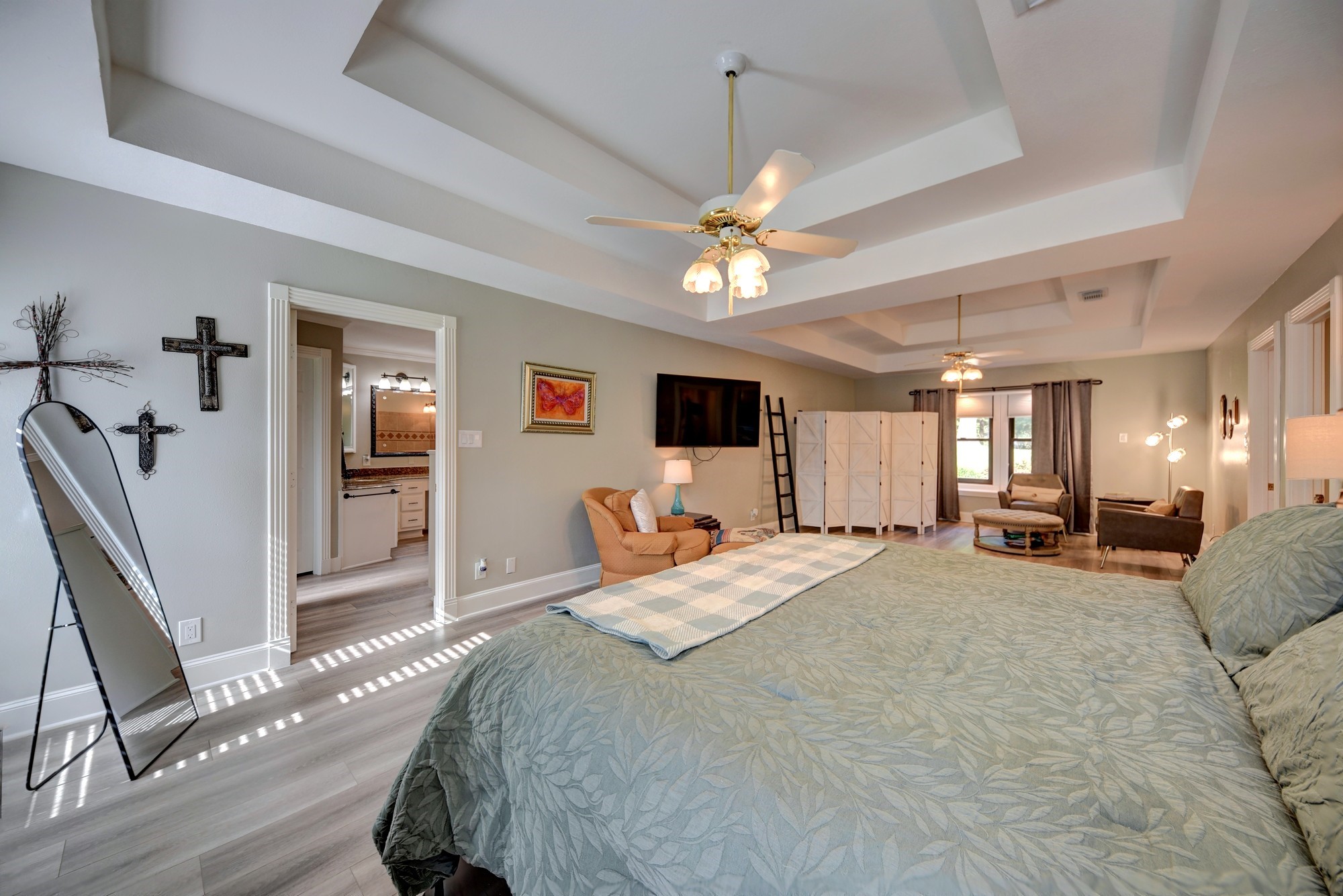 1950 Country Club Road Brenham, TX 77833 - Photo 21 of 39 a spacious bedroom with a bed couch and a window