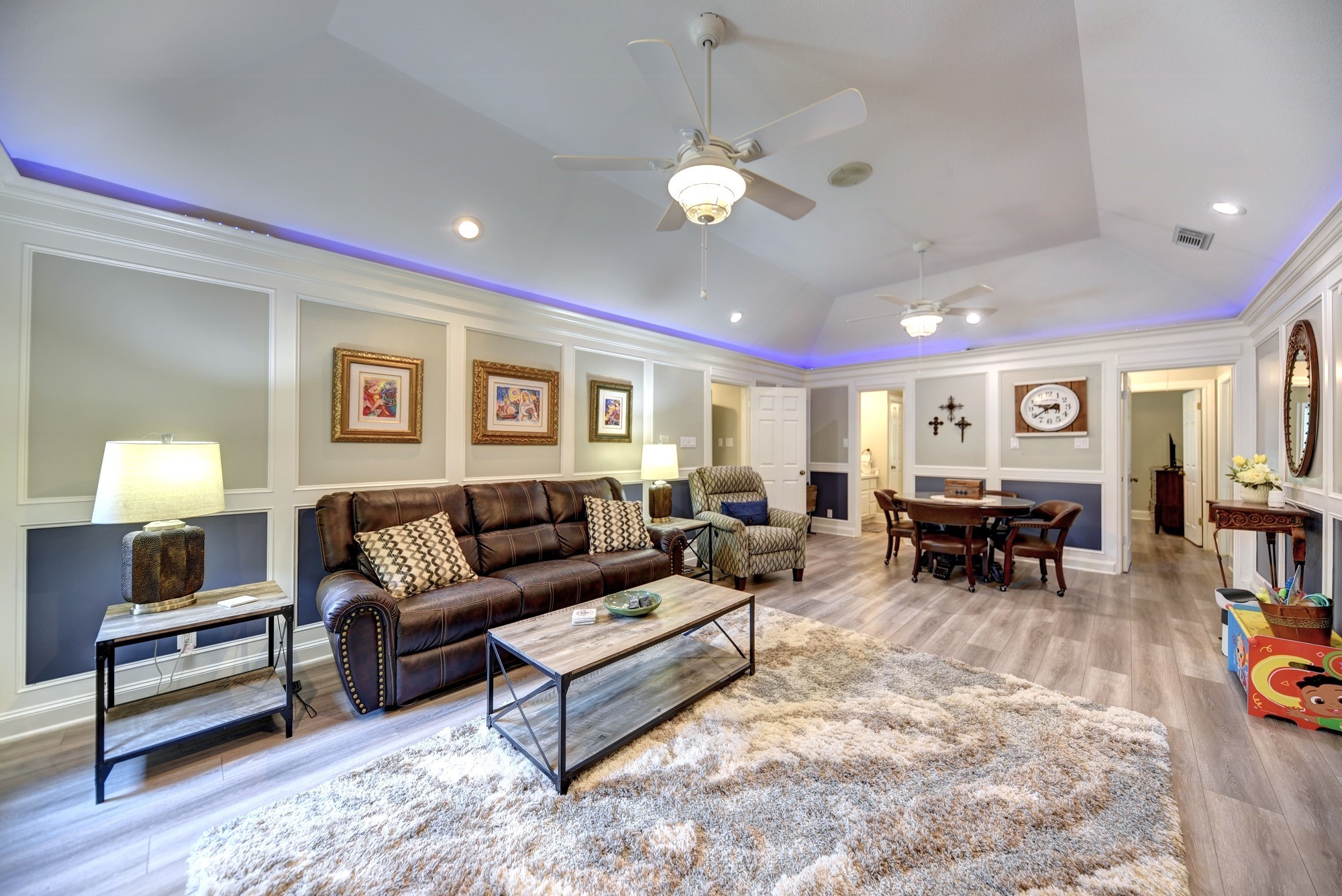 1950 Country Club Road Brenham, TX 77833 - Photo 24 of 39 a living room with furniture and wooden floor