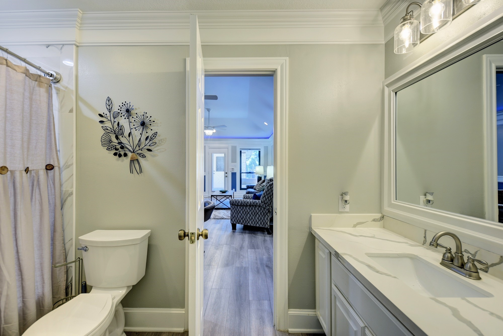 1950 Country Club Road Brenham, TX 77833 - Photo 27 of 39 a bathroom with a sink a toilet and shower