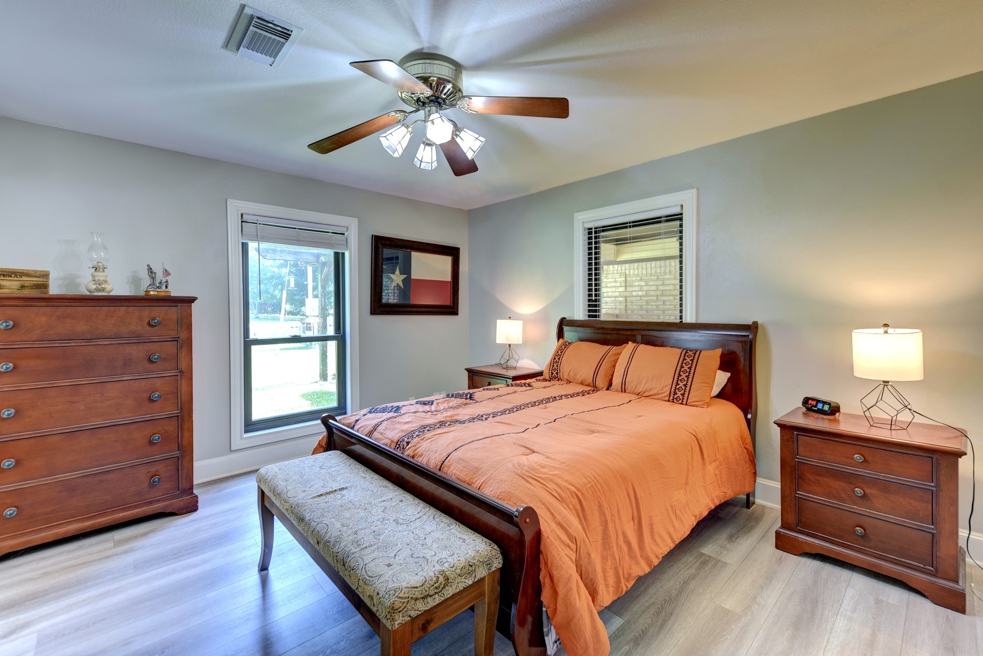 1950 Country Club Road Brenham, TX 77833 - Photo 32 of 39 a bedroom with a bed and wooden floor