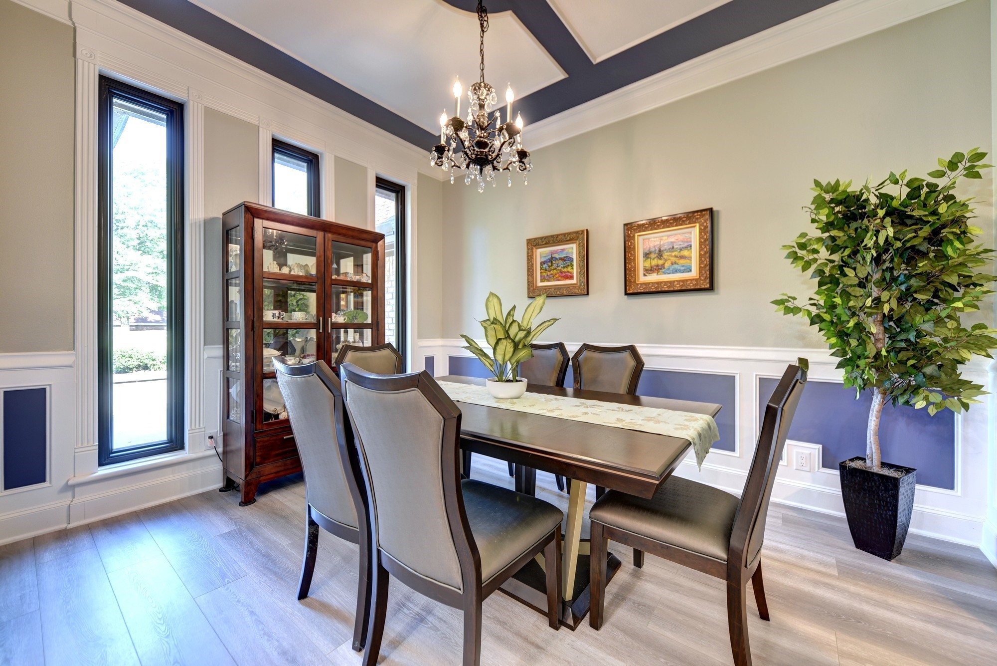 1950 Country Club Road Brenham, TX 77833 - Photo 10 of 39 a view of a dining room with furniture window and wooden floor