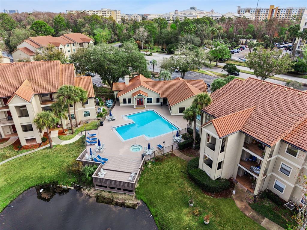 3032 Parkway Boulevard, Unit 305 Kissimmee, FL 34747 - Photo 37 of 40 an aerial view of a house with a garden