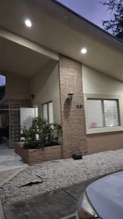 a view of a hallway of a house