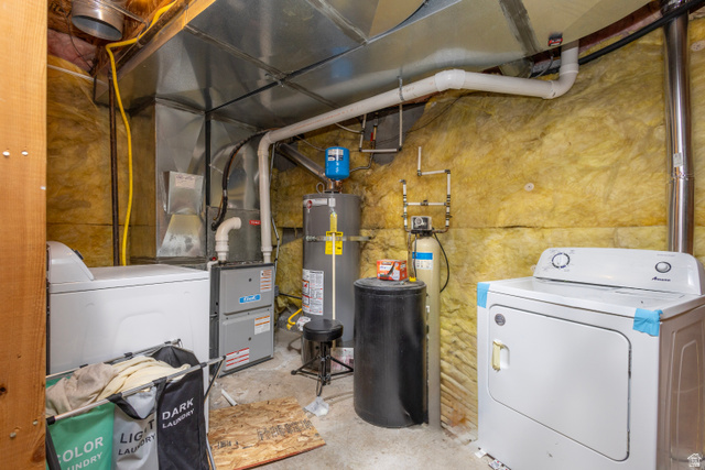 11751 Lake Run Road South Jordan, UT 84009 - Photo 33 of 38 Utility area with exposed insulation, featuring a water heater, furnace, water filtration system, and exposed ductwork
