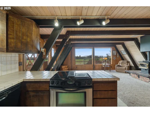 a kitchen with a sink and wooden cabinets