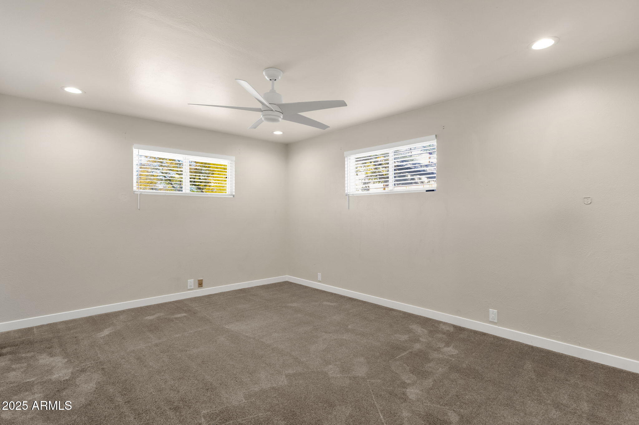 2139 South La Rosa Drive Tempe, AZ 85282 - Photo 15 of 29 an empty room with a window