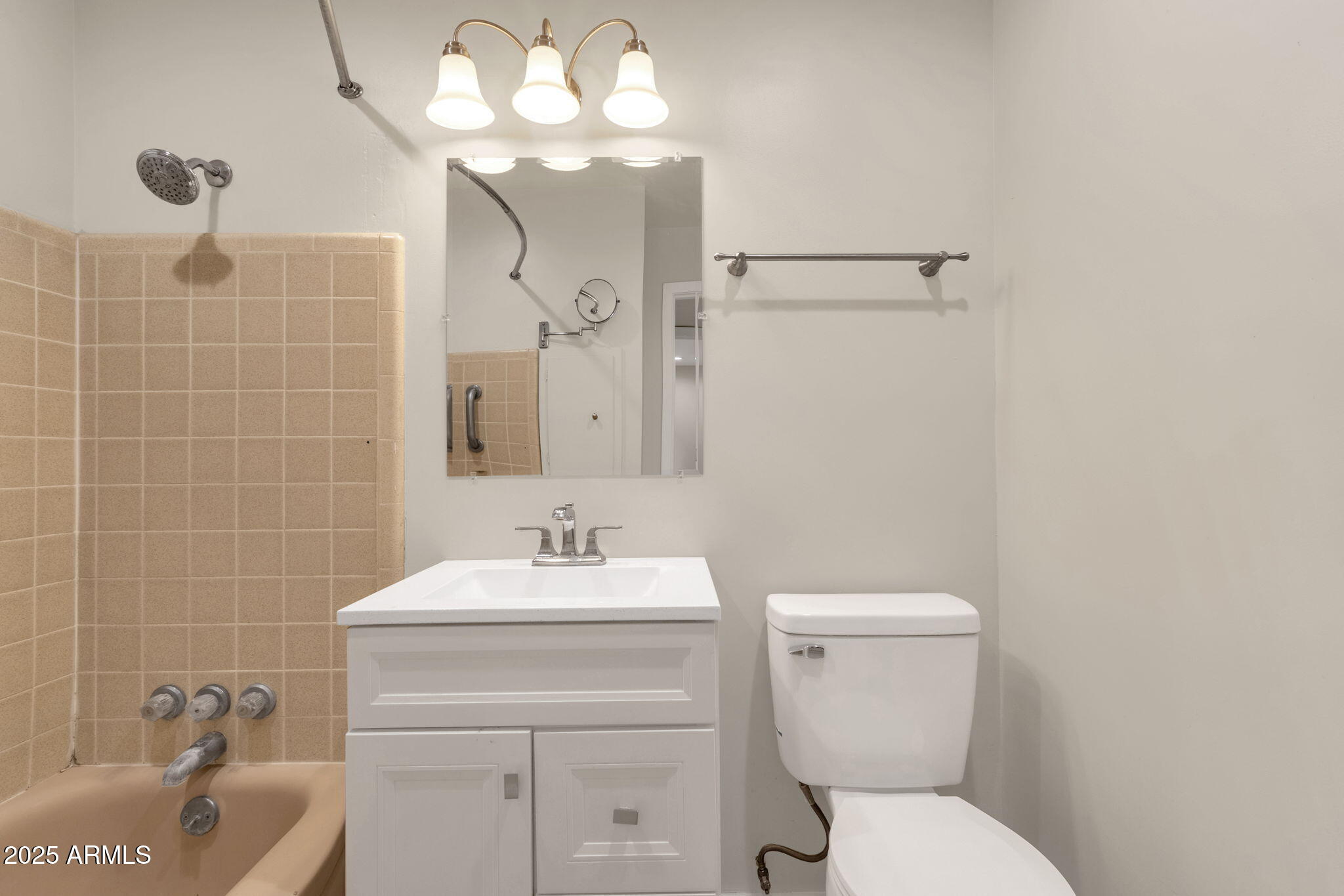 2139 South La Rosa Drive Tempe, AZ 85282 - Photo 20 of 29 a bathroom with a sink a toilet and shower