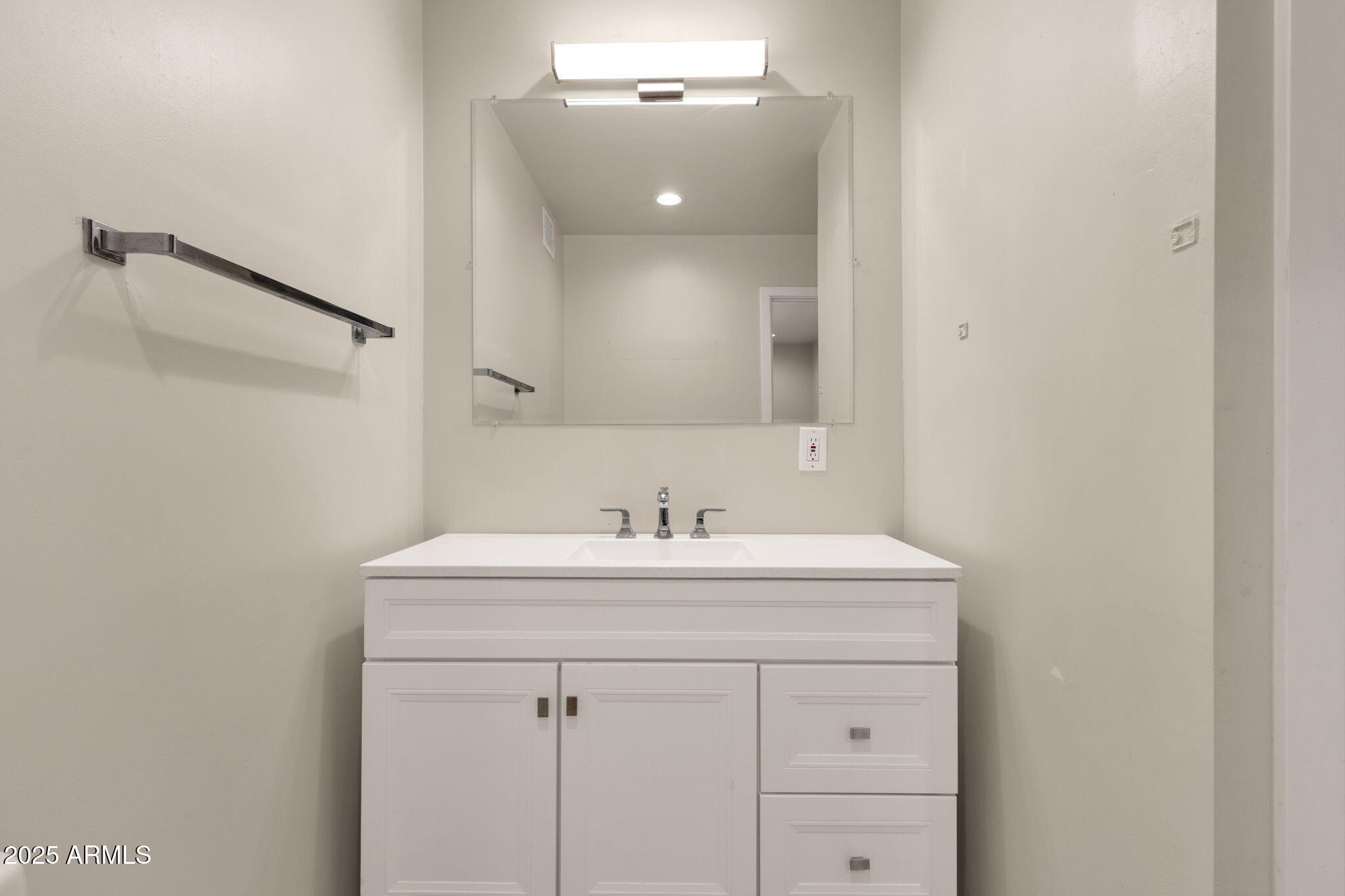 2139 South La Rosa Drive Tempe, AZ 85282 - Photo 21 of 29 a bathroom with a sink vanity and a mirror