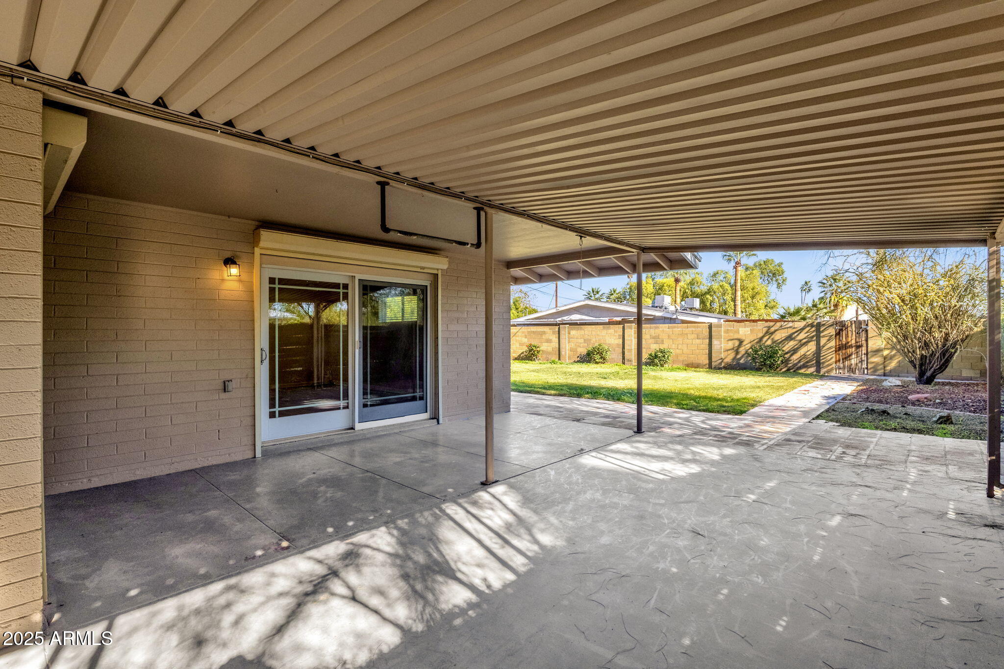 2139 South La Rosa Drive Tempe, AZ 85282 - Photo 23 of 29 a view of a house with a backyard and porch