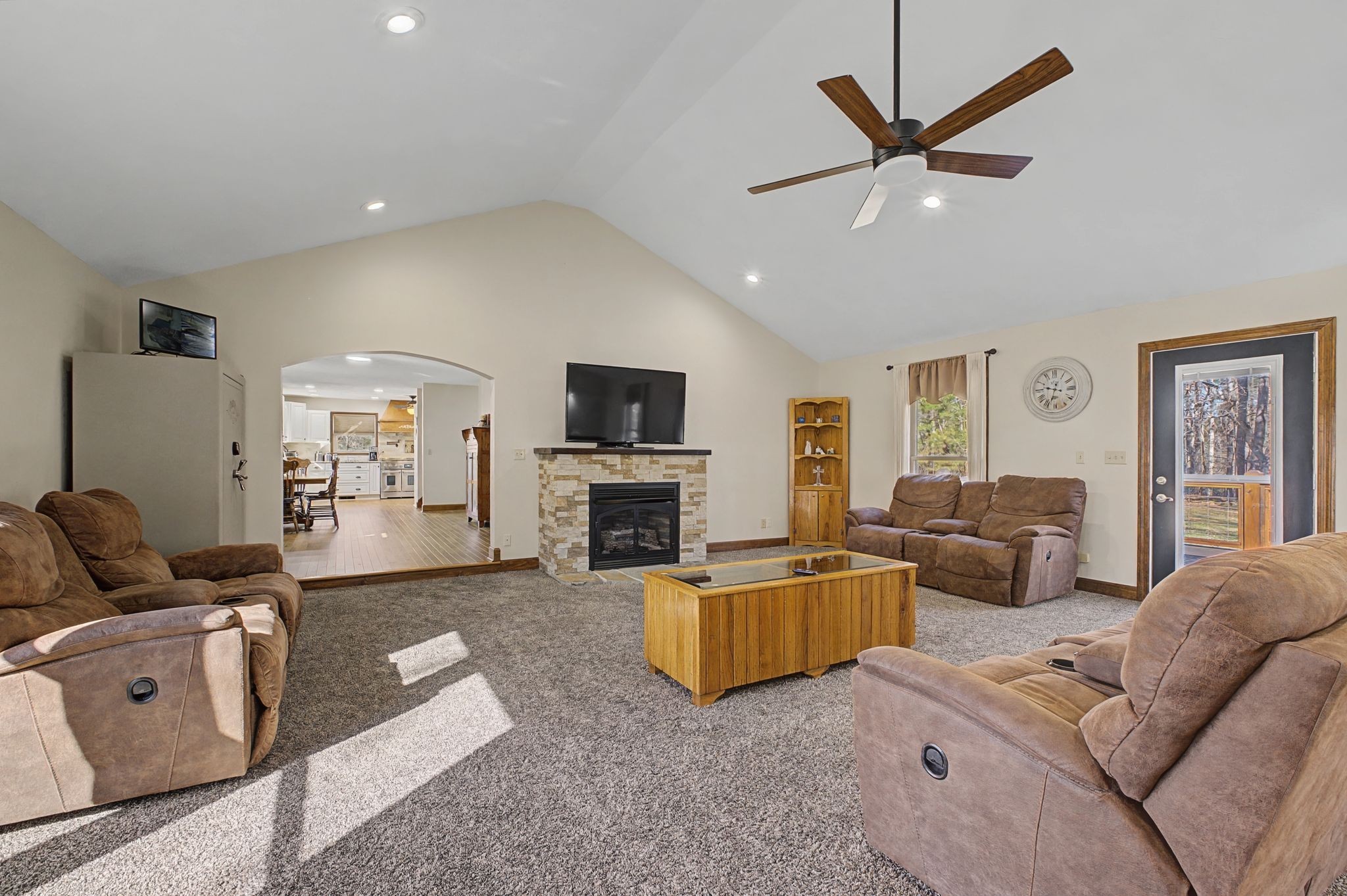 1231 Abiff Road Bon Aqua, TN 37025 - Photo 8 of 60 a living room with furniture and a fireplace