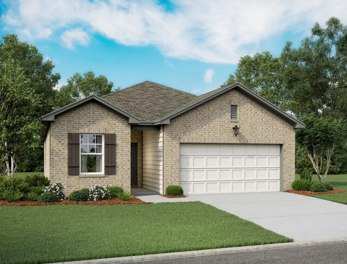 a view of a house with a yard and garage