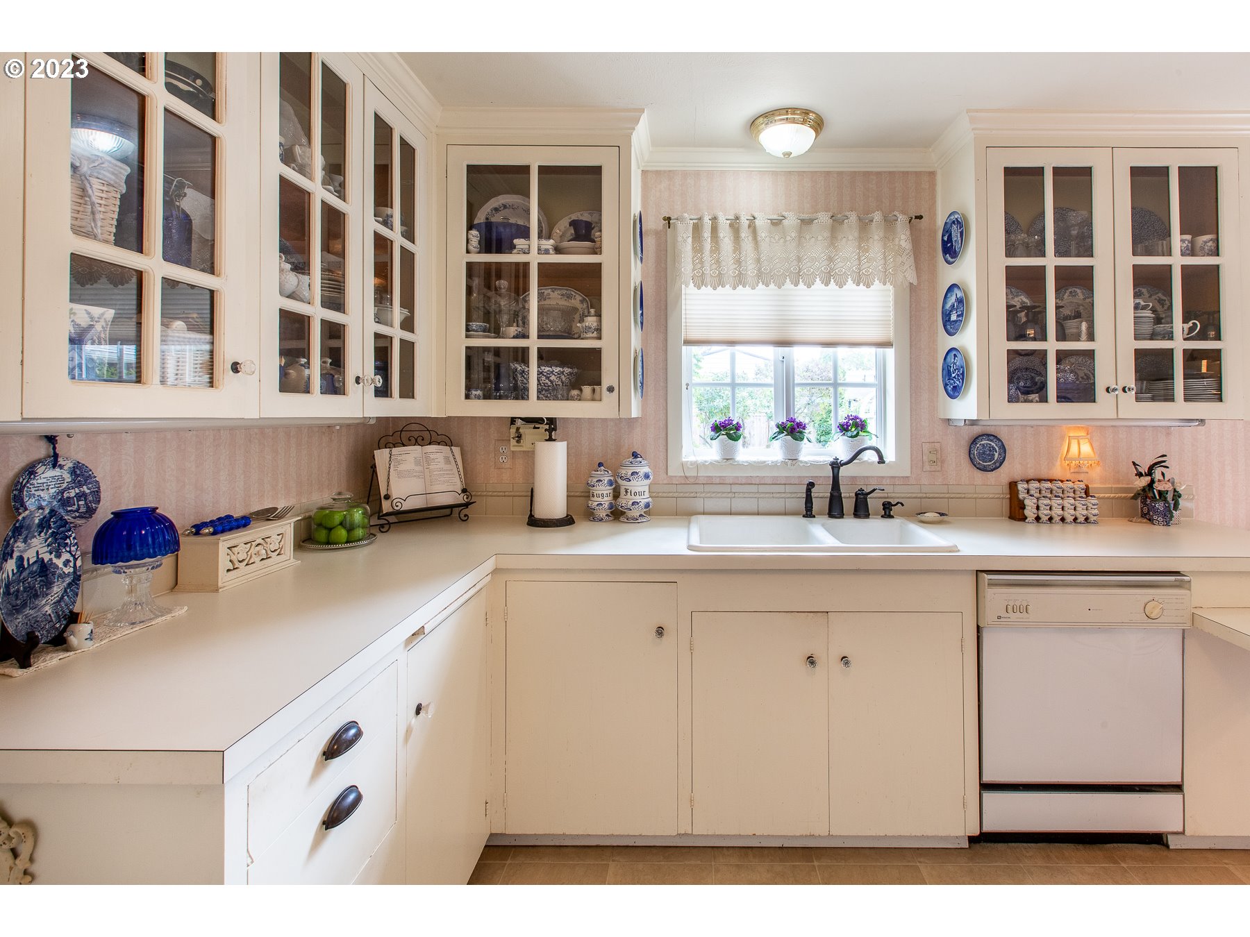 2727 Villa Way Springfield, OR 97477 - Photo 14 of 41 a kitchen with a sink and cabinets