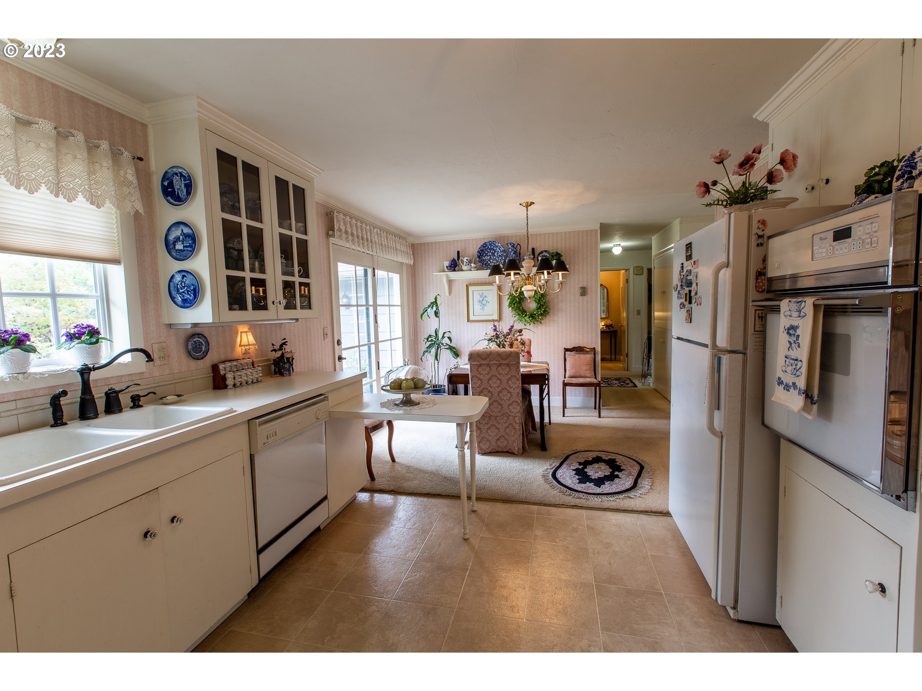 2727 Villa Way Springfield, OR 97477 - Photo 15 of 41 a kitchen with stainless steel appliances granite countertop a refrigerator and a sink