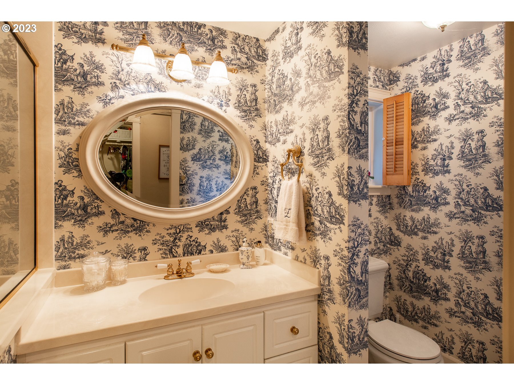 2727 Villa Way Springfield, OR 97477 - Photo 22 of 41 a bathroom with a sink mirror vanity and shower