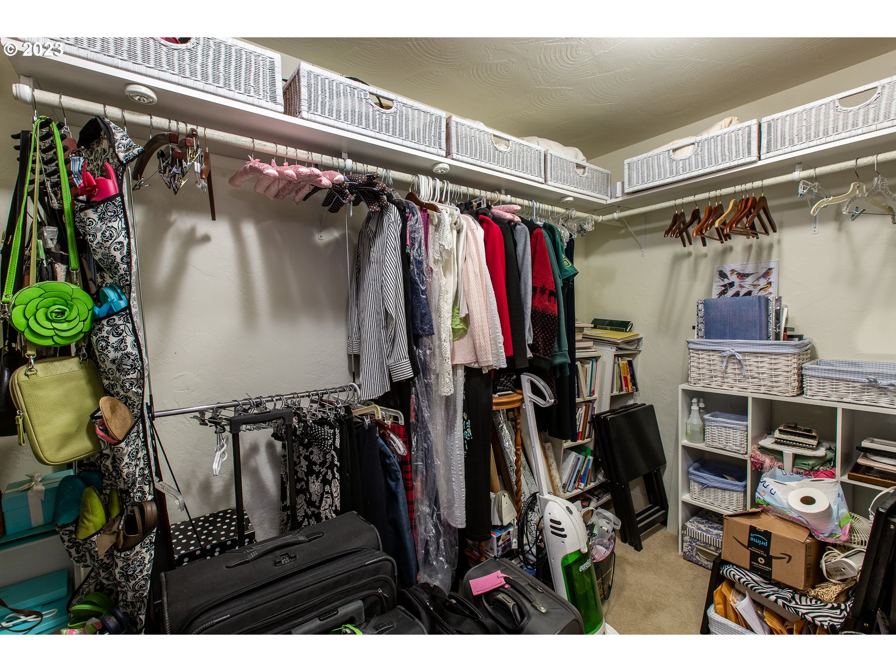2727 Villa Way Springfield, OR 97477 - Photo 24 of 41 a view of walk in closet with clothes and shoes