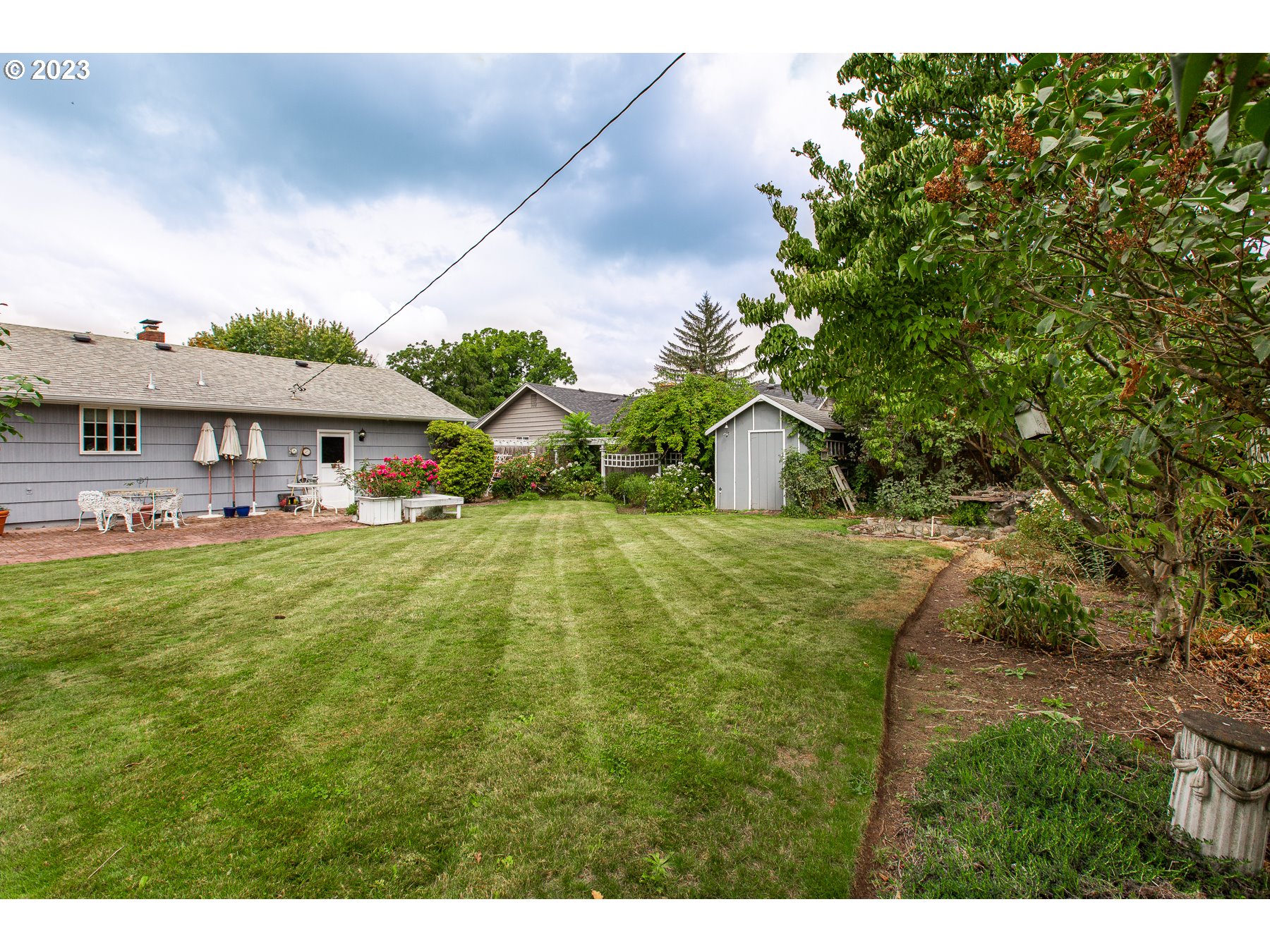 2727 Villa Way Springfield, OR 97477 - Photo 36 of 41 a view of an house with backyard space and balcony