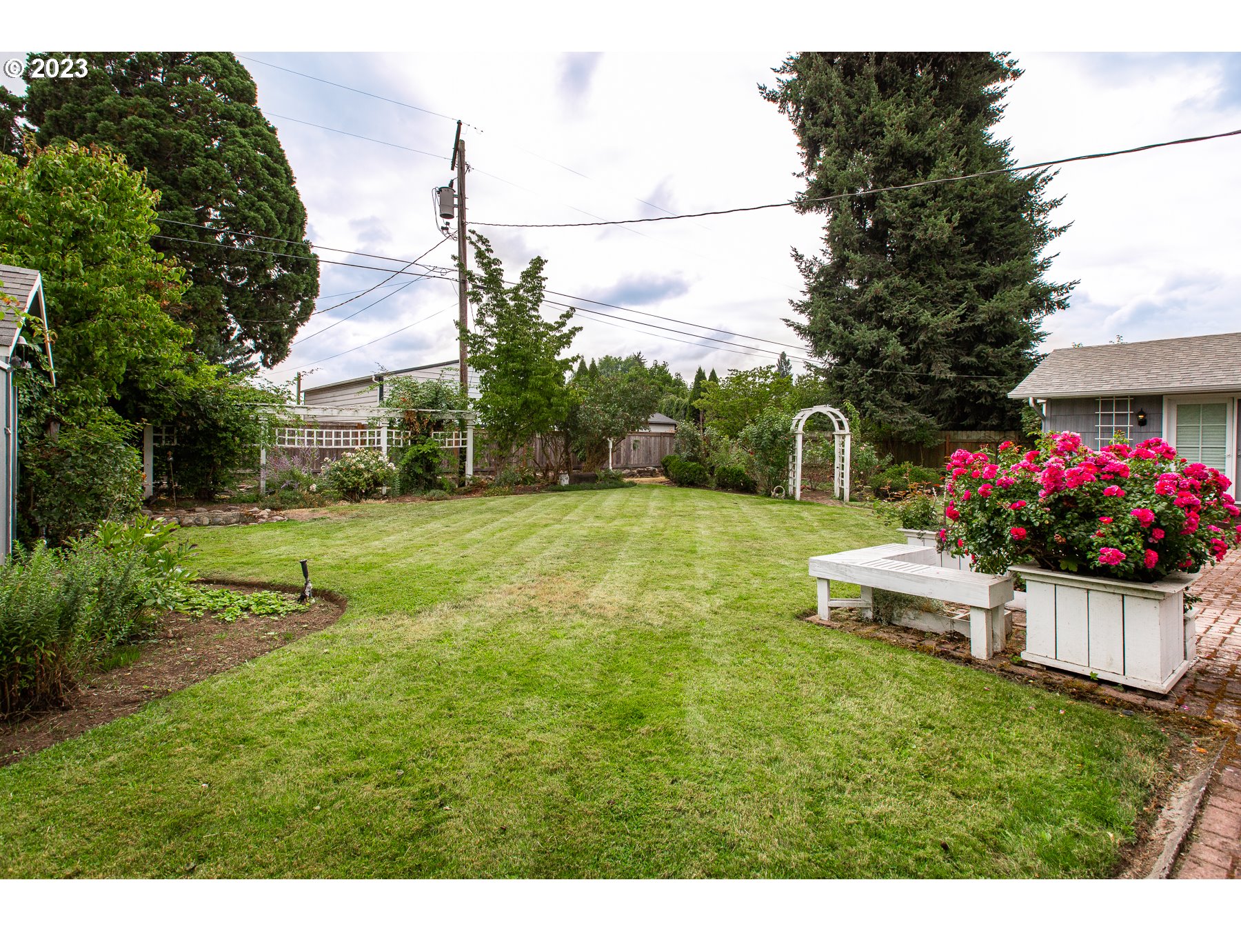 2727 Villa Way Springfield, OR 97477 - Photo 41 of 41 a view of a house with a yard and potted plants