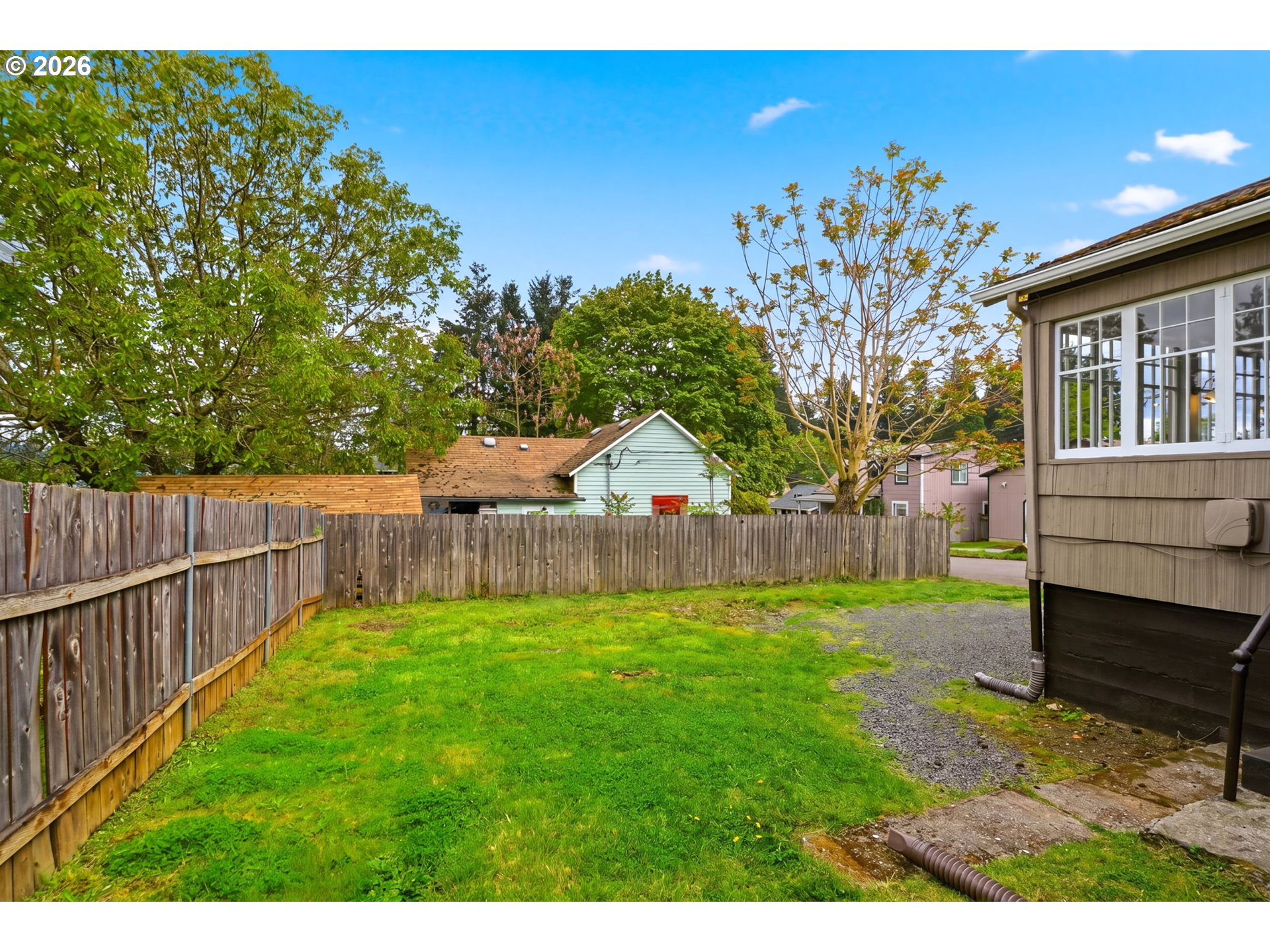 1804 Division Street Camas, WA 98607 - Photo 37 of 43 a view of a backyard with a garden