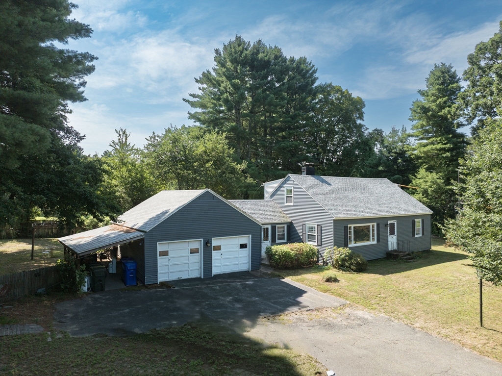 58 Bennett Road Hampden, MA 01036 - Photo 1 of 41 front view of a house with a yard