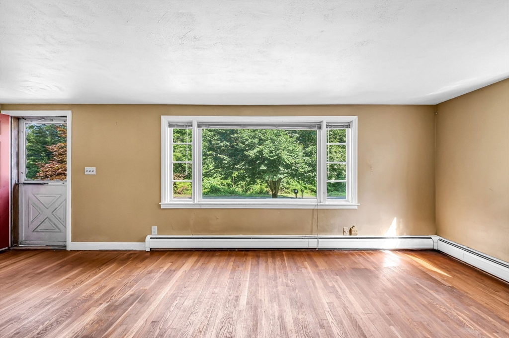58 Bennett Road Hampden, MA 01036 - Photo 15 of 41 a view of a room with wooden floor and window
