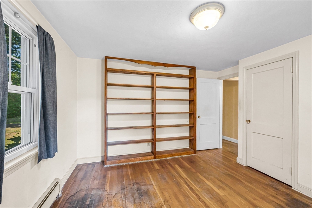 58 Bennett Road Hampden, MA 01036 - Photo 23 of 41 wooden floor in an empty room with a window