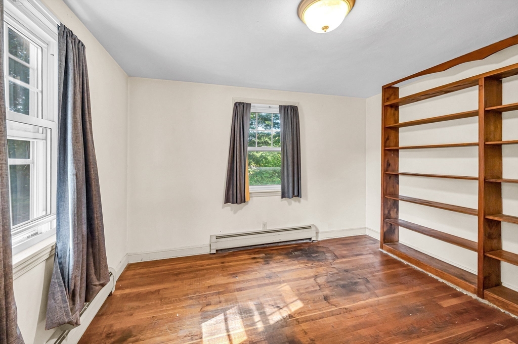 58 Bennett Road Hampden, MA 01036 - Photo 24 of 41 a view of an empty room with window and stairs