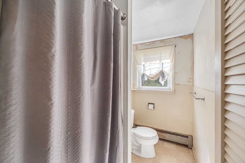 58 Bennett Road Hampden, MA 01036 - Photo 34 of 41 a bathroom with a toilet and a sink