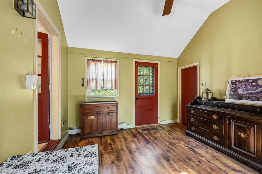 58 Bennett Road Hampden, MA 01036 - Photo 6 of 41 a bedroom with a bed and wooden floor