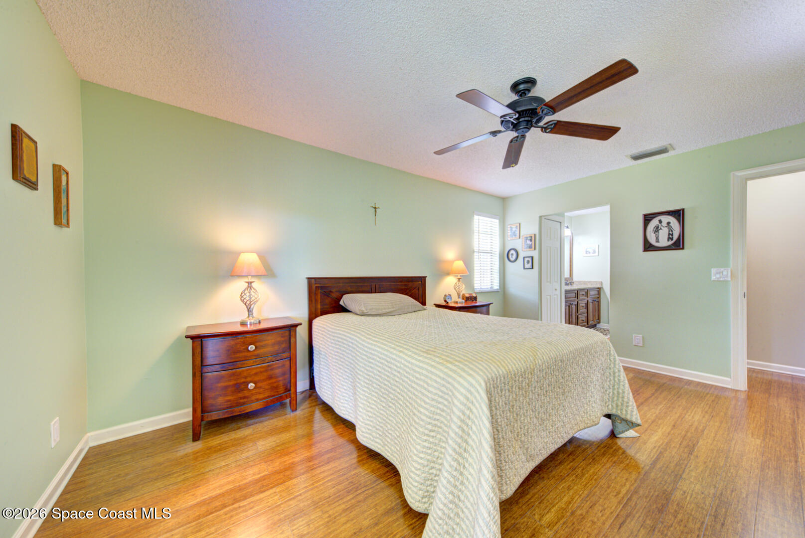 1142 Keystone Drive, Unit F Jupiter, FL 33458 - Photo 24 of 43 primary bedroom with ensuite