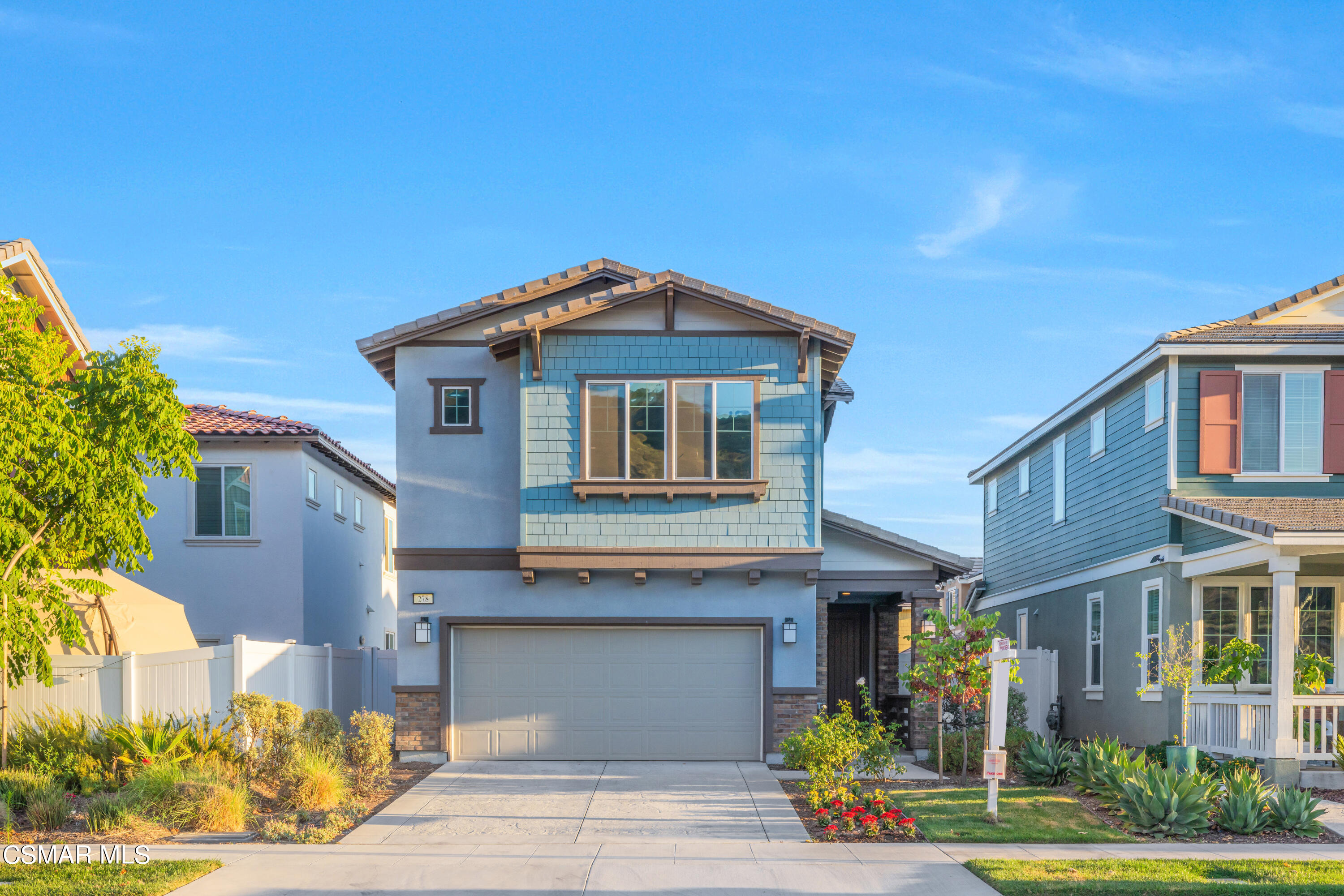 278 Hydrangea Street Fillmore, CA 93015 - Photo 2 of 22 a front view of a house with a yard
