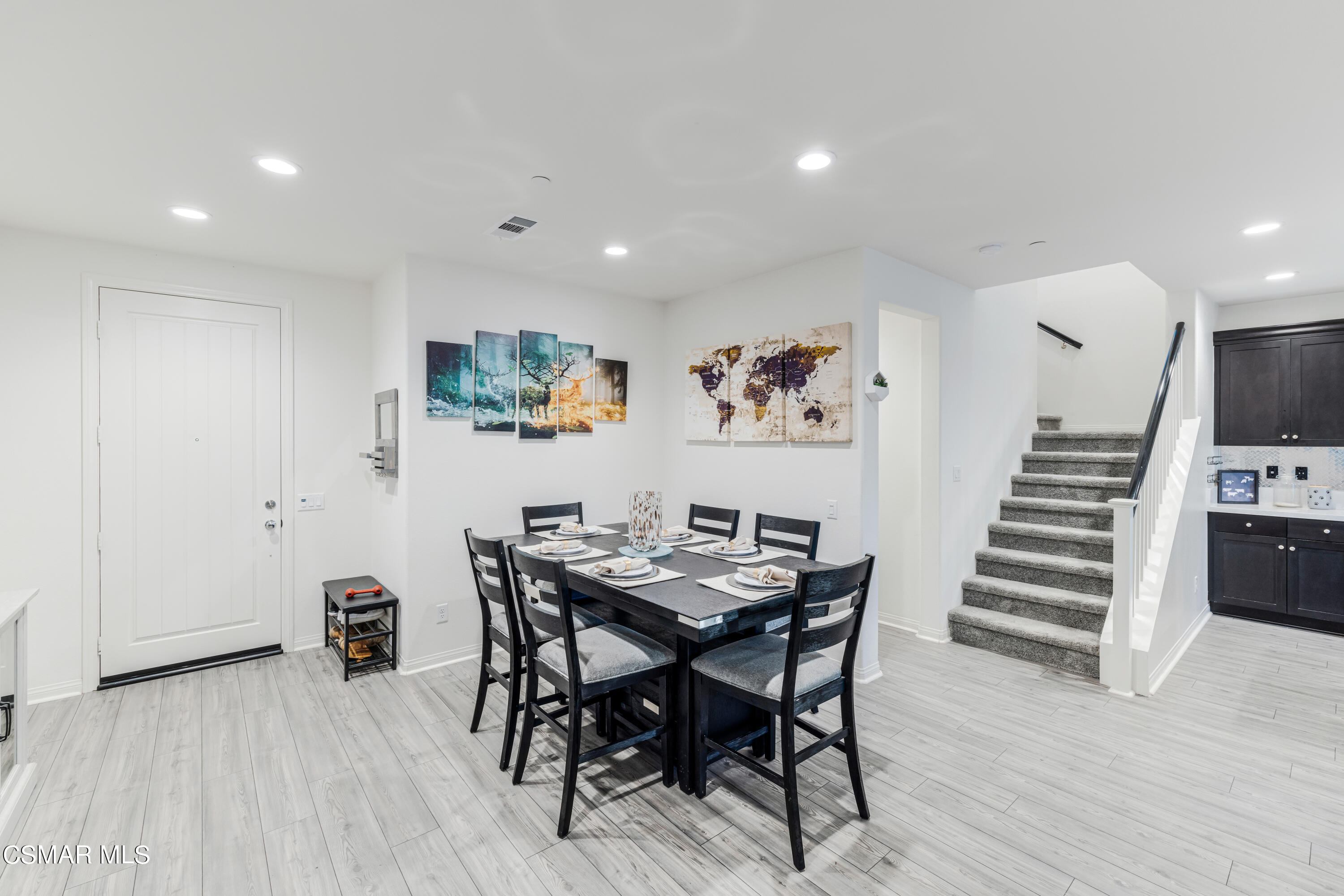 278 Hydrangea Street Fillmore, CA 93015 - Photo 5 of 22 a view of a dining room with furniture and wooden floor