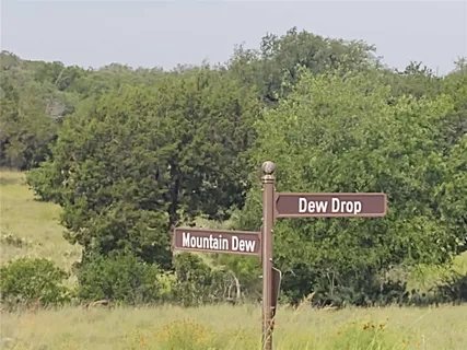 a sign that is on the side of a street