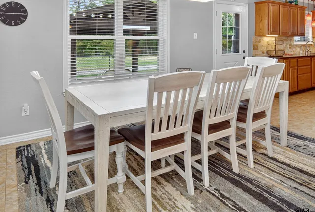 a view of a balcony with furniture