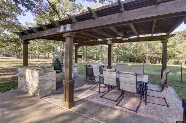a view of a backyard of the house