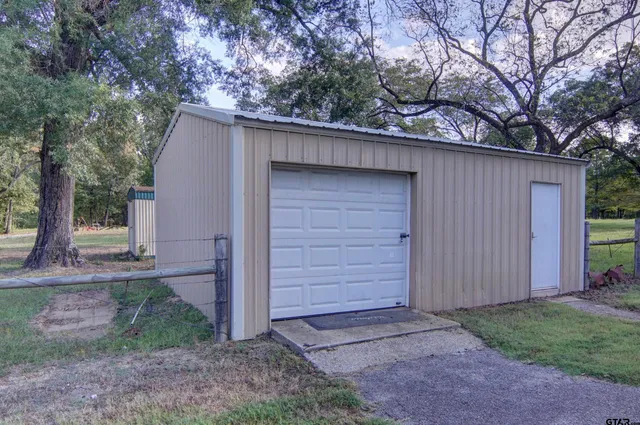 a view of backyard with green space