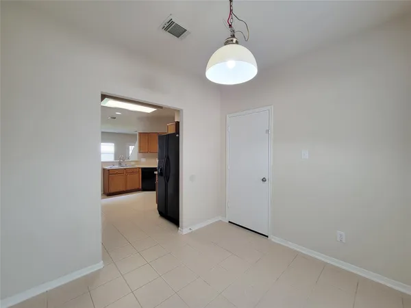 a view of a kitchen and a sink
