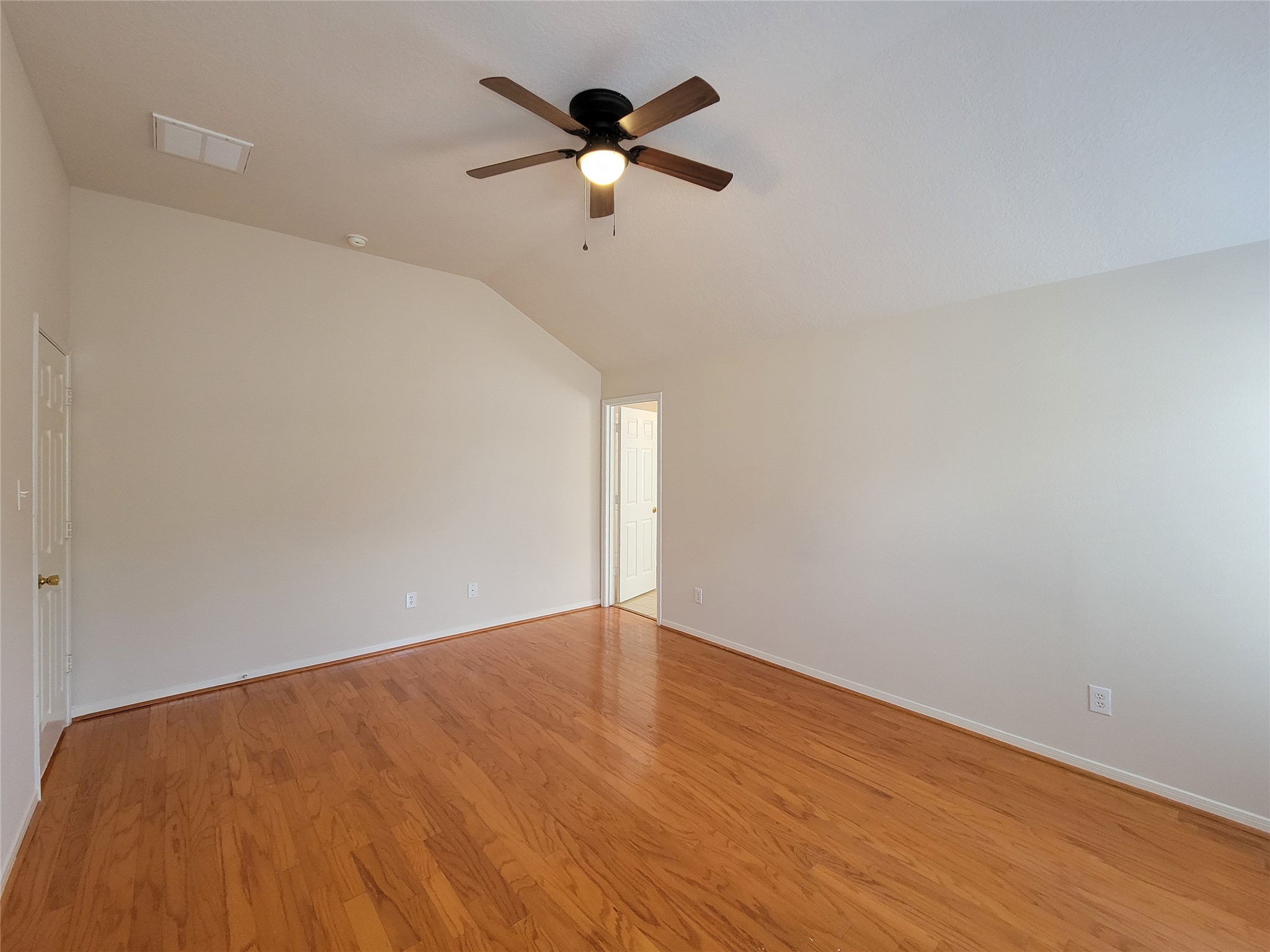 19330 Harvest Stream Way Houston, TX 77084 - Photo 40 of 50 wooden floor in an empty room