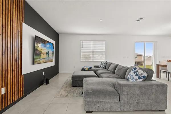 a living room with furniture and a couch