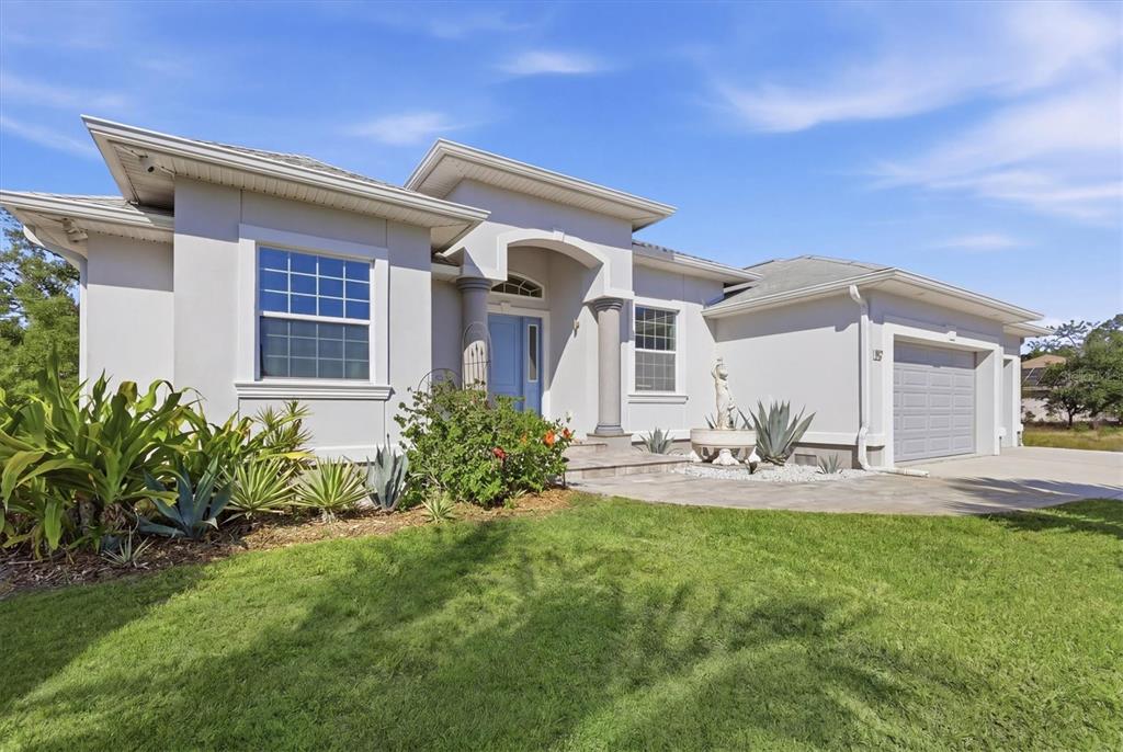 1112 Seneca Road Venice, FL 34293 - Photo 11 of 50 a view of a house with backyard and sitting area