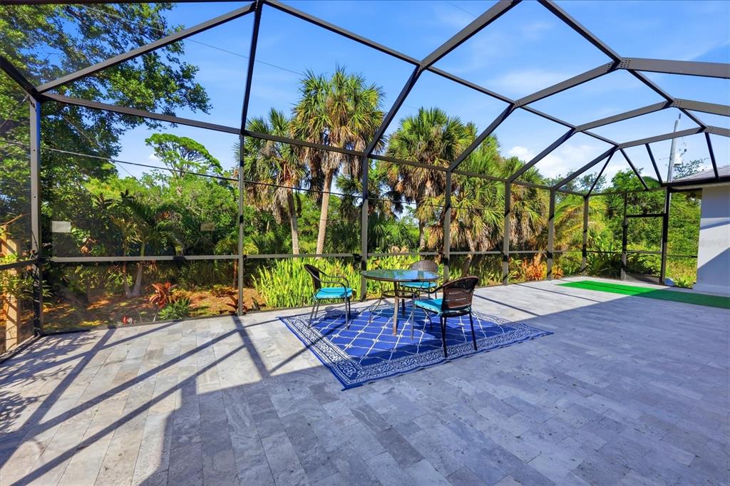 1112 Seneca Road Venice, FL 34293 - Photo 39 of 50 a view of a bench in a patio