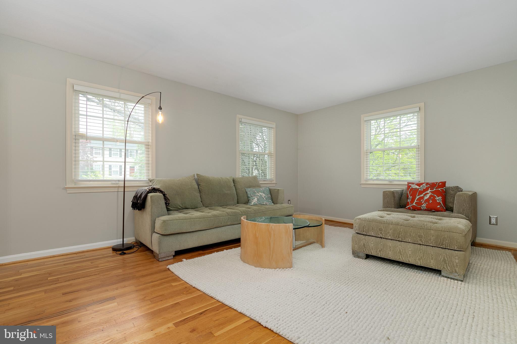 8208 Jeb Stuart Road Potomac, MD 20854 - Photo 3 of 32 Formal living room with wood floors.
