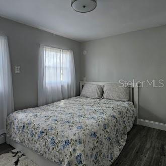 7127 West Grover Cleveland Boulevard, Unit 48 Homosassa, FL 34446 - Photo 4 of 18 a bedroom with a bed and window