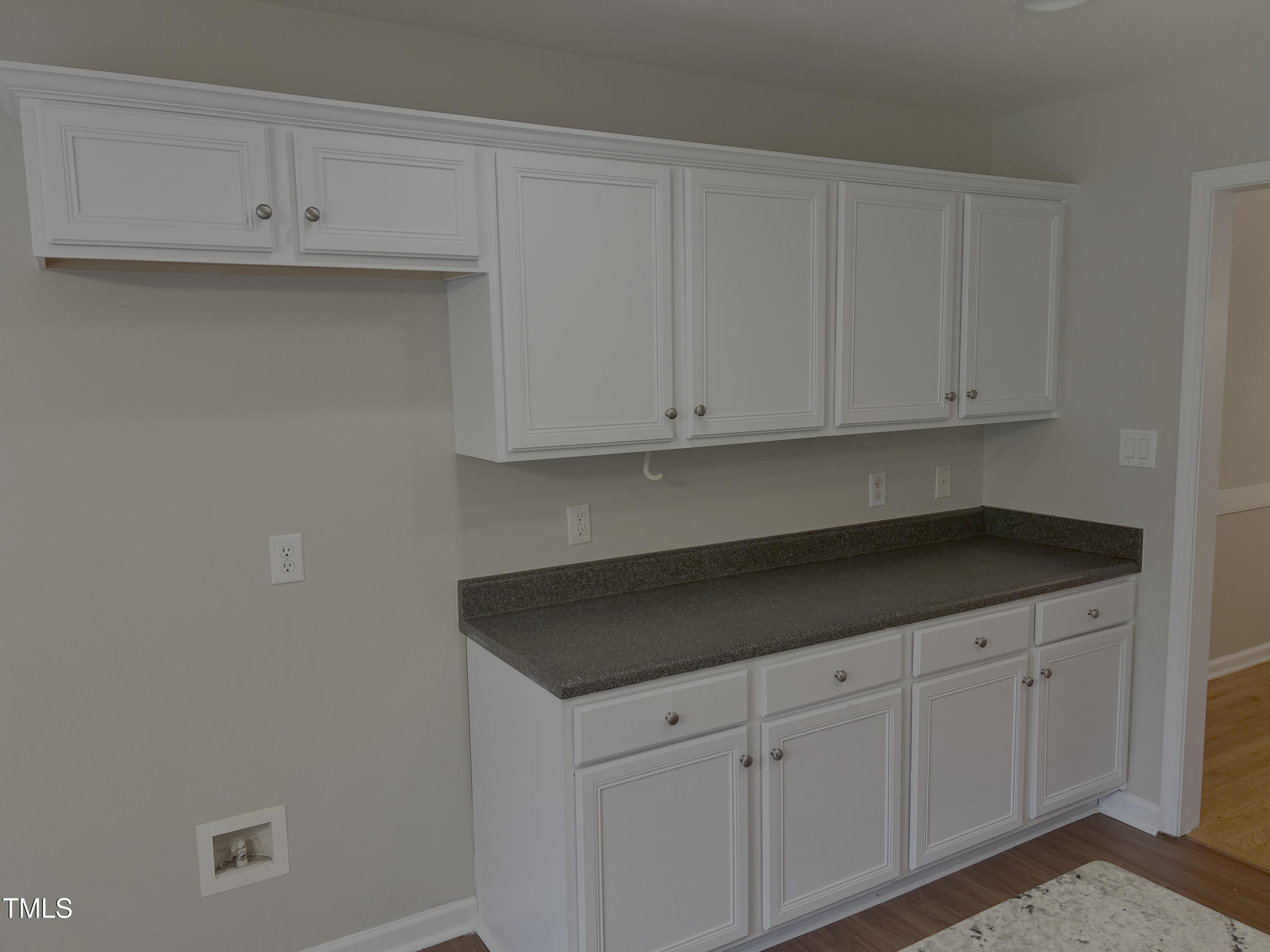 133 Rustic Lane Smithfield, NC 27577 - Photo 11 of 24 a kitchen with granite countertop white cabinets and a sink