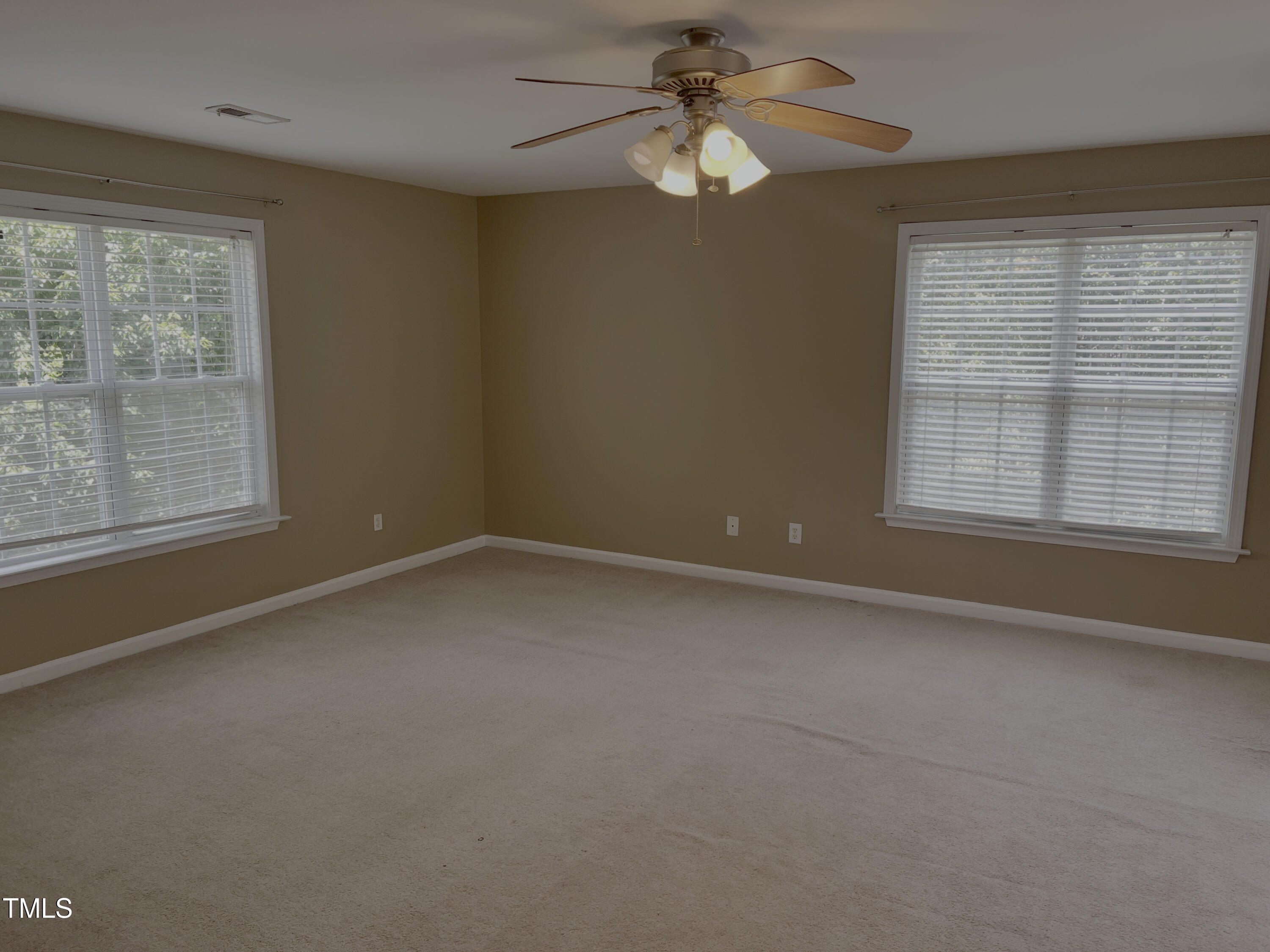 133 Rustic Lane Smithfield, NC 27577 - Photo 24 of 24 an empty room with a window