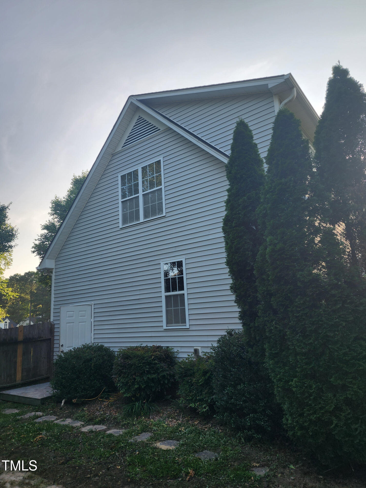133 Rustic Lane Smithfield, NC 27577 - Photo 4 of 24 a view of a house with a yard
